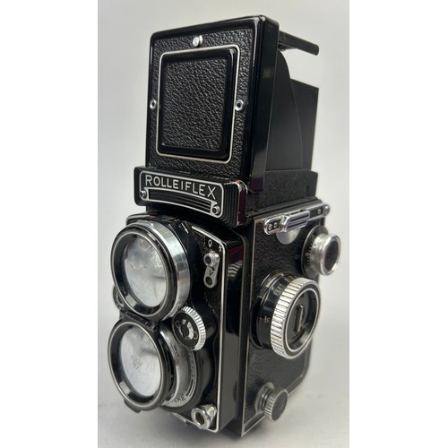 254 - ROLLEIFLEX 2.8 E Camera in original case with neck strap and lens hood (full working order) along wi... 