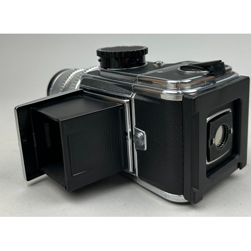 255 - A 1981 HASSELBLAD 500 C/M Camera with SONNAR 150 mm Lens and A.12 back.

Full working order and in v... 