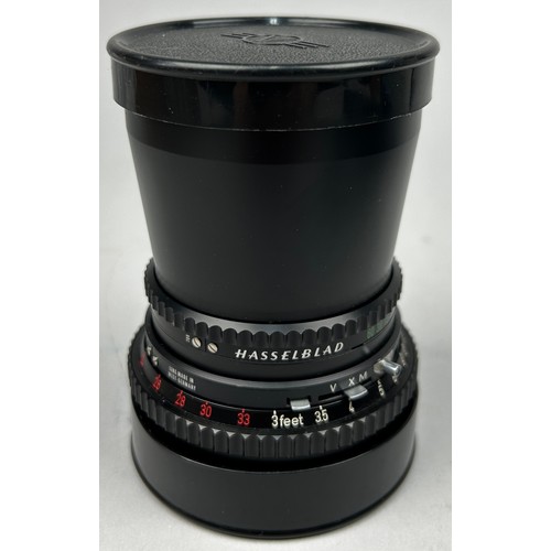 257 - A HASSELBLAD BLACK DISTAGON C 50MM LENS WITH FRONT AND REAR CAPS 
Very good condition and in full wo... 