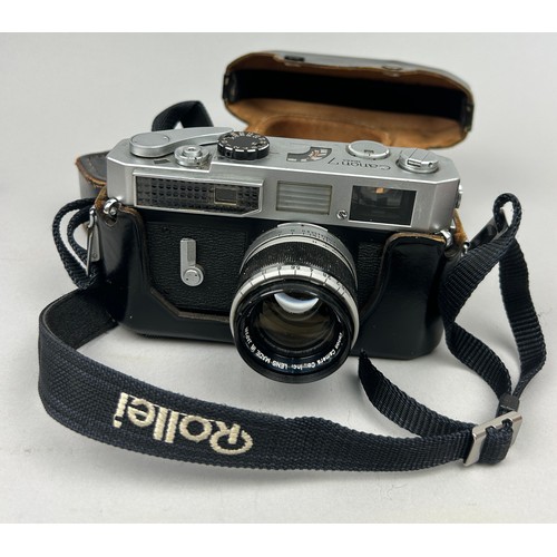 262 - A CANON MODEL 7 RANGEFINDER CAMERA WITH CANON 50MM F 1.8 LENS, in original black leather makers case... 