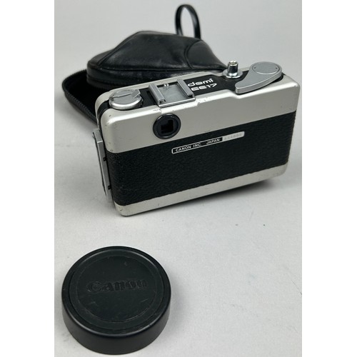 267 - A CANON DEMI EE17 CAMERA, lens cap, in original leather makers case with makers wriststrap.