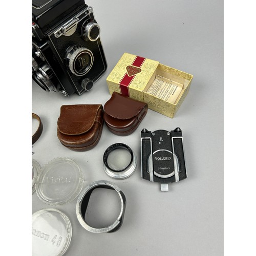 254 - ROLLEIFLEX 2.8 E Camera in original case with neck strap and lens hood (full working order) along wi... 