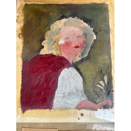 180 - A REVERSE PAINTING ON GLASS OF A CHILD IN A RED CAPE, mounted in an ornately carved leaf and berry f... 