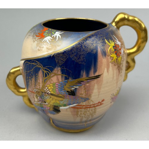 95 - CARLTON WARE 'SKETCHING BIRD' DESIGN CERAMIC VASE, gilt twin handled, glazed with painted finished.
... 