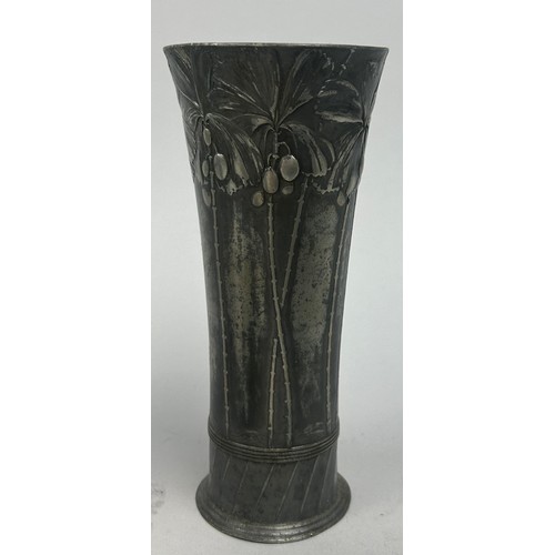 141 - A GROUP OF THREE ART NOUVEAU PEWTER VESSELS, including a twin handled cup (3)

20cm in height