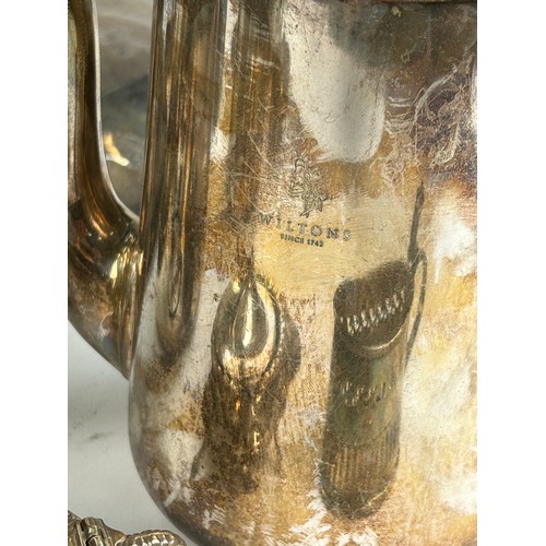 129 - A LARGE COLLECTION OF SILVER PLATED JUGS AND OTHER ITEMS, to include teapots, salt cellars (Qty)