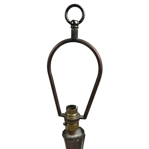 156 - IN THE MANNER OF TIFFANY STUDIOS (1899-1930), faux bronze table lamp naturalistically figured with s... 