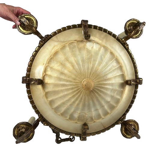 153 - A HEAVY BRASS CHANDELIER WITH FOUR ARMS AND CENTRAL ALABASTER SHADE,