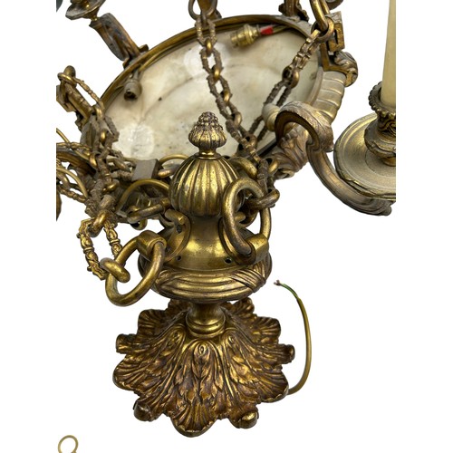 153 - A HEAVY BRASS CHANDELIER WITH FOUR ARMS AND CENTRAL ALABASTER SHADE,