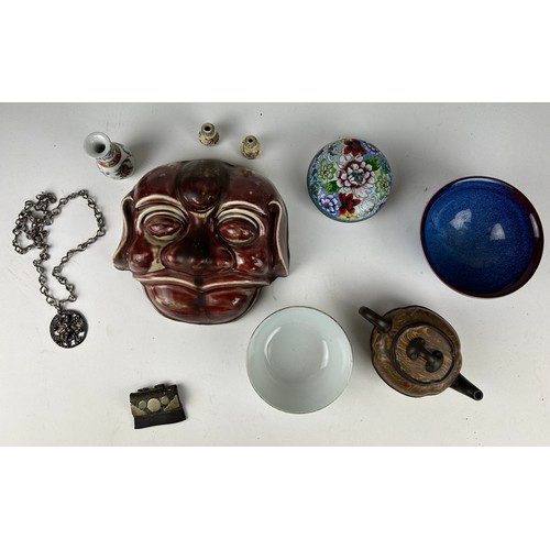 75 - A COLLECTION OF CHINESE ITEMS TO INCLUDE A YI XING TEA POT, mask of a man, small bottles and bowls.
... 