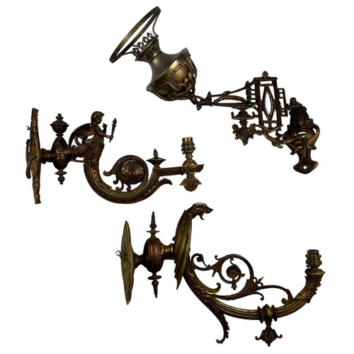 157 - THREE ART NOUVEAU WALL SCONCES, brass with winged cherubs and panthers (3)

Largest 40cm x 30cm