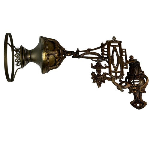 157 - THREE ART NOUVEAU WALL SCONCES, brass with winged cherubs and panthers (3)

Largest 40cm x 30cm