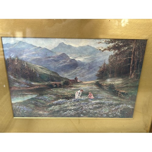 212 - TWO PRINTS OF LADIES IN FIELDS BENEATH MOUNTAIN RANGES, mounted in frames and glazed (2)