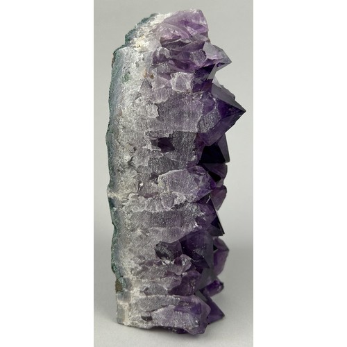 9 - A MEXICAN AMETHYST OBELISK,
 
High grade, freestanding Amethyst cluster from Mexico.

20cm in height