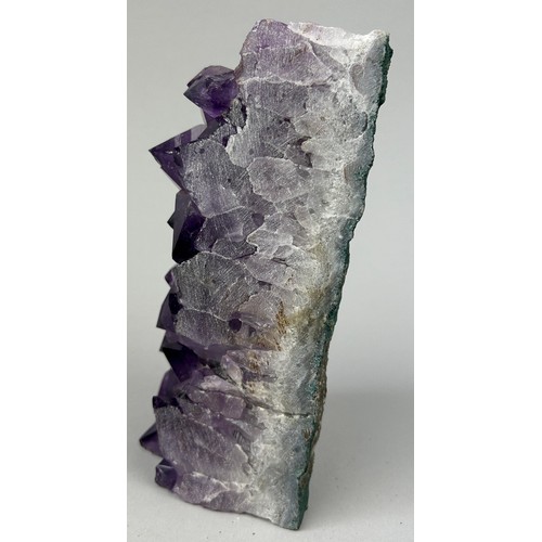 9 - A MEXICAN AMETHYST OBELISK,
 
High grade, freestanding Amethyst cluster from Mexico.

20cm in height