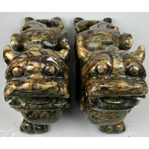 78A - A PAIR OF CHINESE HARD STONE TEMPLE LIONS, 

40cm x 25cm x 12cm each