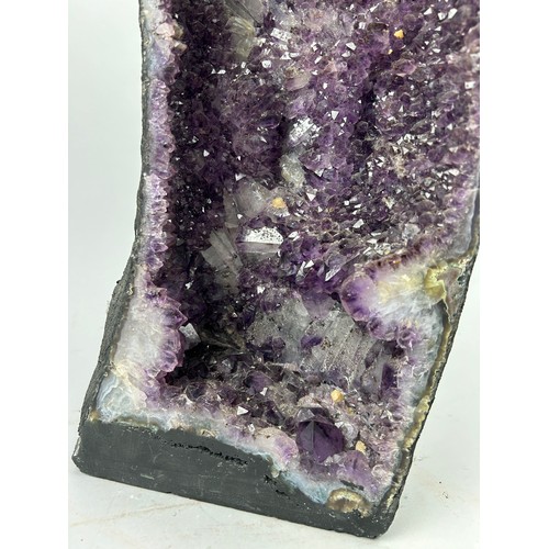 8A - A LARGE PURPLE AMETHYST GEODE, 

65cm x 25cm