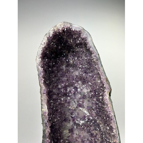 8A - A LARGE PURPLE AMETHYST GEODE, 

65cm x 25cm