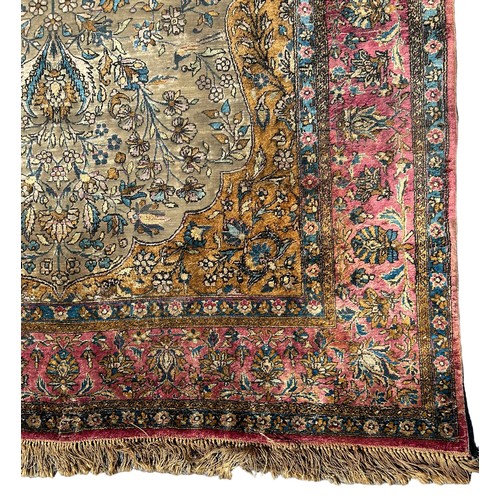 204 - A FINE TURKISH SILK HEREKE RUG DEPICTING THE TREE OF LIFE AND BIRD FIELD WITH FOLIATE BORDER

210cm ... 