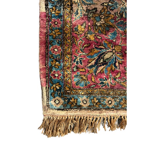 204 - A FINE TURKISH SILK HEREKE RUG DEPICTING THE TREE OF LIFE AND BIRD FIELD WITH FOLIATE BORDER

210cm ... 