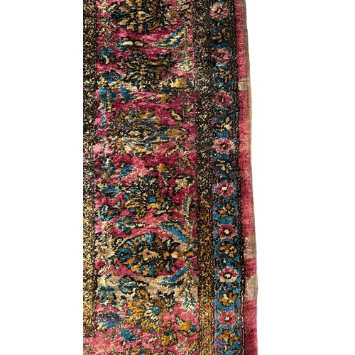 204 - A FINE TURKISH SILK HEREKE RUG DEPICTING THE TREE OF LIFE AND BIRD FIELD WITH FOLIATE BORDER

210cm ... 