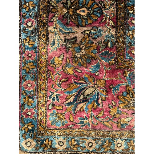 204 - A FINE TURKISH SILK HEREKE RUG DEPICTING THE TREE OF LIFE AND BIRD FIELD WITH FOLIATE BORDER

210cm ... 