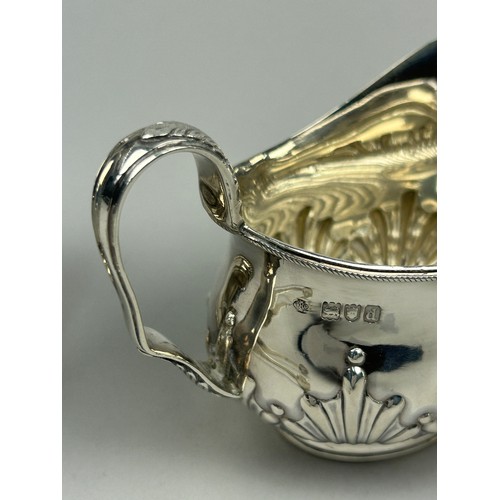 60 - VARIOUS SILVER ITEMS, to include a tea pot, milk pail, sugar shaker and tongs (4)

Various silversmi... 