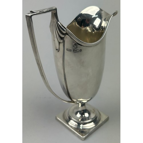 61 - A VICTORIAN SILVER CUP BY JAMES DEAKIN AND SONS, with large handle mounted on a base.

Total weight:... 