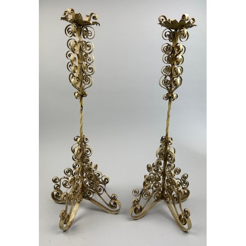 213 - A PAIR OF CANDLESTICKS, painted metal with scrolling decoration (2)

58cm in height each