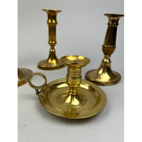 224 - A COLLECTION OF BRASS CANDLESTICKS (7)