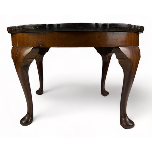 198 - A REPRODUCTION LOW TABLE, raised on four cabriole legs