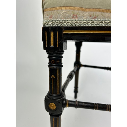 181 - AN AESTHETIC MOVEMENT EBONISED SIDE CHAIR OF GOTHIC DESIGN, with pierced back rail of shaped arches ... 