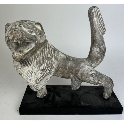 241 - A SCULPTURAL LIMED WOODEN FIGURE OF A LION, mounted on an ebonised stand

30cm x 25cm

**Please note... 