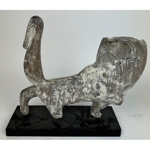 241 - A SCULPTURAL LIMED WOODEN FIGURE OF A LION, mounted on an ebonised stand

30cm x 25cm

**Please note... 