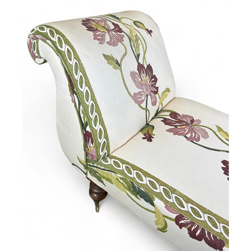 183 - A VICTORIAN CHAISE LOUNGE UPHOLSTERED IN CONTEMPORARY FABRIC OF FOLIATE DESIGN, raised on baluster l... 