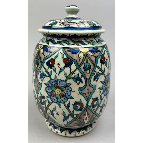 228 - AFTER WILLIAM DE MORGAN (1839-1917), jar and cover painted in the iznik palette raised on a circular... 