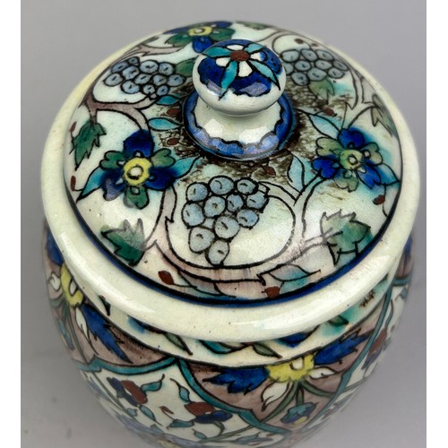 228 - AFTER WILLIAM DE MORGAN (1839-1917), jar and cover painted in the iznik palette raised on a circular... 