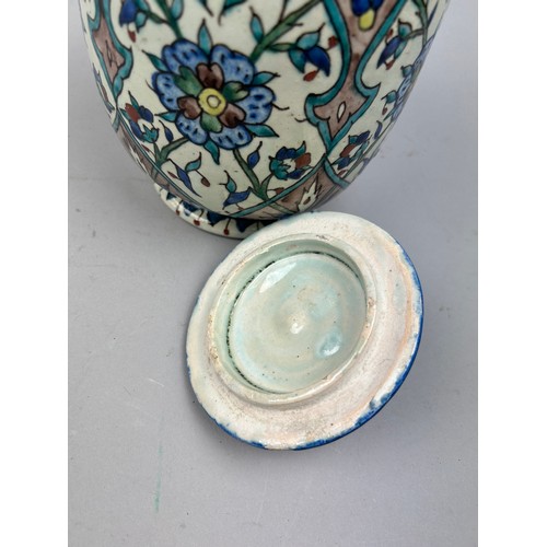 228 - AFTER WILLIAM DE MORGAN (1839-1917), jar and cover painted in the iznik palette raised on a circular... 