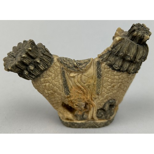 77 - A CHINESE SEAL IN THE FORM OF A TEMPLE LION, probably 20th Century

9cm x 8cm