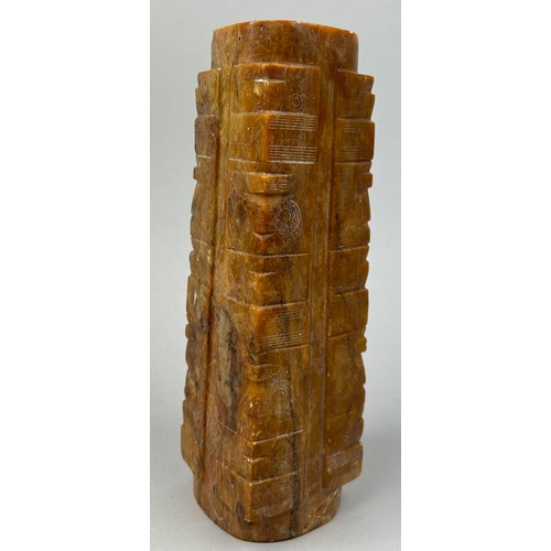 72 - A CHINESE HARDSTONE OR JADE TALL VESSEL OF ARCHAIC FORM, incised with various symbols and marks. 

2... 