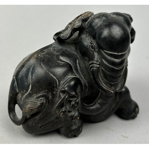 73 - A CHINESE BRONZE 'ELEPHANT' PAPERWEIGHT,

Late 19th/early 20th. 

10cm x 8cm 

For similar see Roseb... 