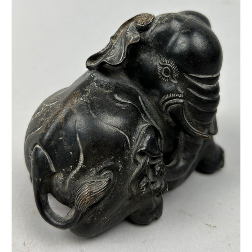 73 - A CHINESE BRONZE 'ELEPHANT' PAPERWEIGHT,

Late 19th/early 20th. 

10cm x 8cm 

For similar see Roseb... 