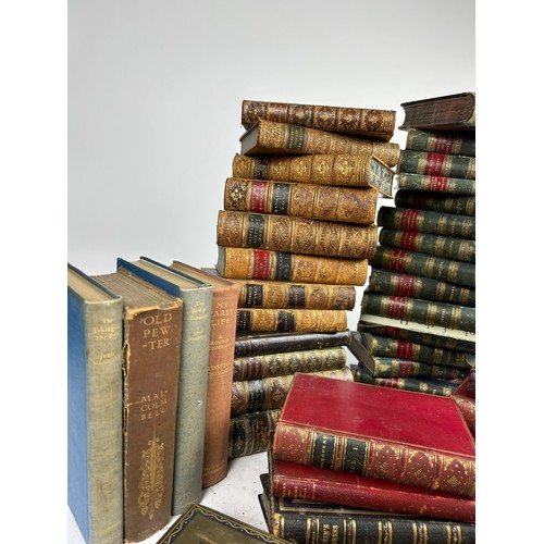 26 - DECORATIVE BINDINGS: A LARGE QUANTITY OF LEATHER BOUND BOOKS, along with some cloth bound. 

Various... 