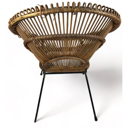 179 - A MID CENTURY RATTAN AND METAL CHAIR IN THE MANNER OF FRANCO ALBINI (1905-1977)

85cm x 80cm