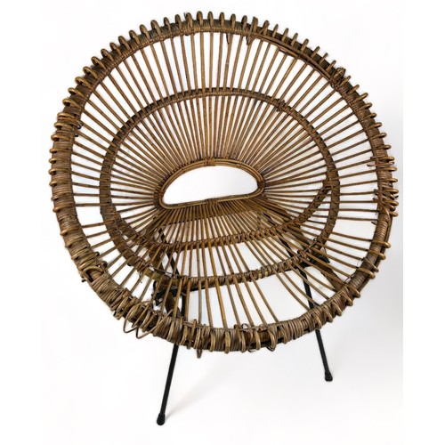 179 - A MID CENTURY RATTAN AND METAL CHAIR IN THE MANNER OF FRANCO ALBINI (1905-1977)

85cm x 80cm