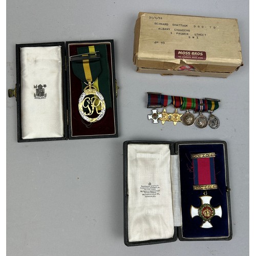 66 - A DISTINGUISHED SERVICE ORDER MEDAL (DSO) IN ORIGINAL GARRARD AND CO CASE, along with a territorial ...