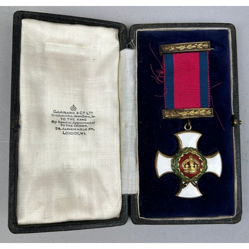 66 - A DISTINGUISHED SERVICE ORDER MEDAL (DSO) IN ORIGINAL GARRARD AND CO CASE, along with a territorial ... 