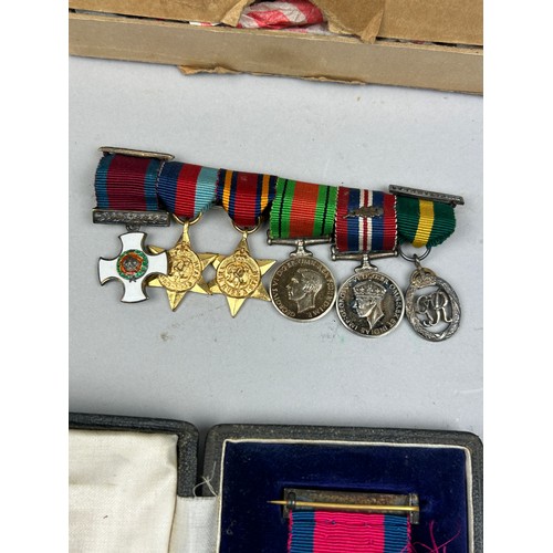 66 - A DISTINGUISHED SERVICE ORDER MEDAL (DSO) IN ORIGINAL GARRARD AND CO CASE, along with a territorial ... 