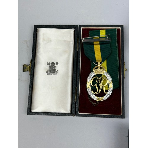 66 - A DISTINGUISHED SERVICE ORDER MEDAL (DSO) IN ORIGINAL GARRARD AND CO CASE, along with a territorial ... 