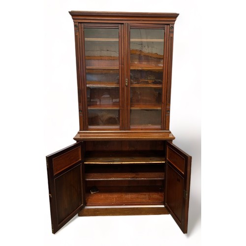 194 - A VICTORIAN MAHOGANY BOOKCASE,

The upper section consisting of two glazed doors with four inner she... 